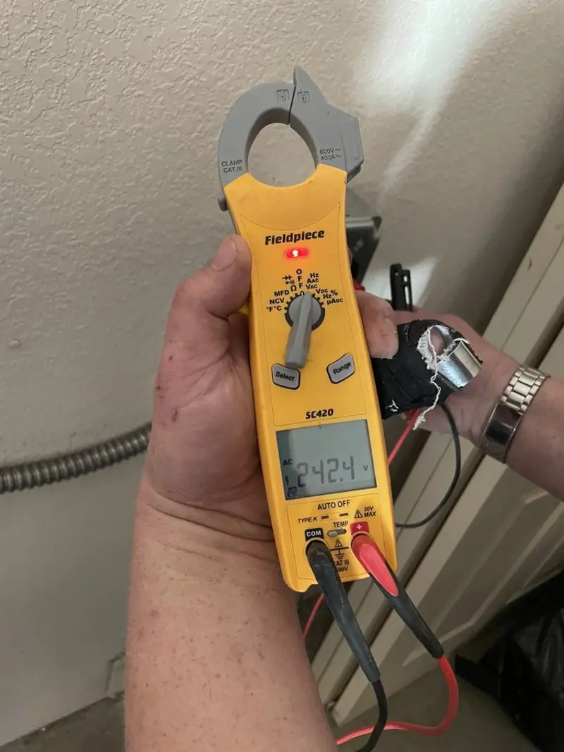 Voltage testing with clamp meter during Generator Installation in Green Oak